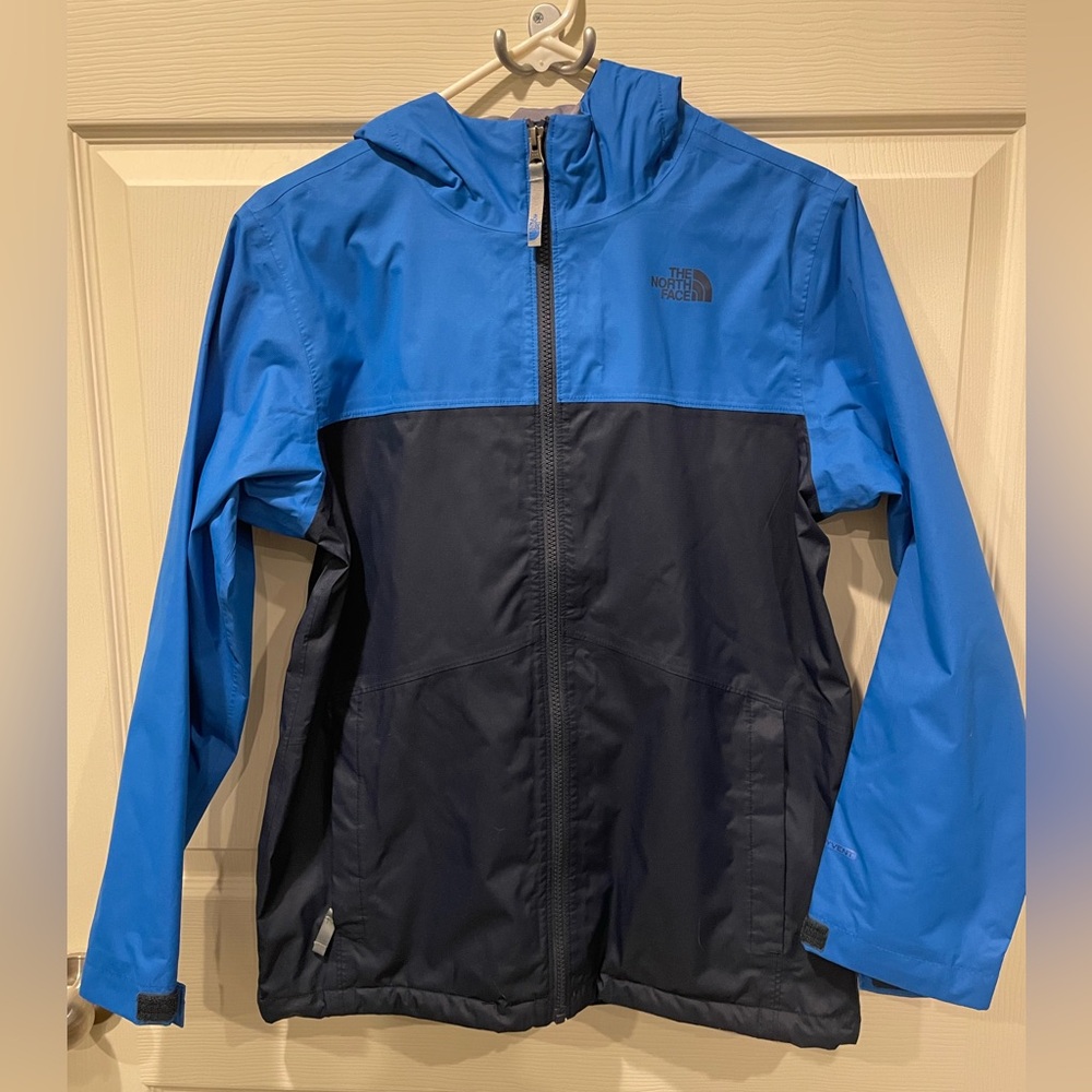 The North Face blue raincoat like new 14-16